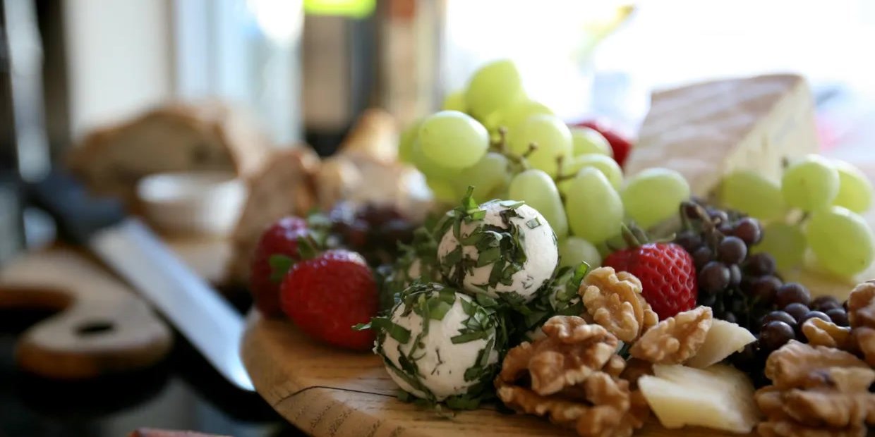 Wine and cheese grazing board catered for a Denver anniversary celebration