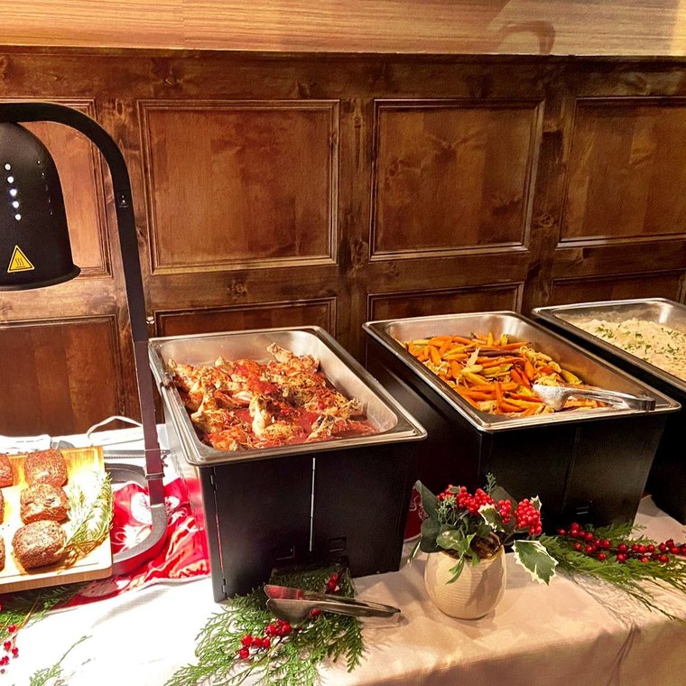 Family-style gathering catered by Silver Spoons in Denver