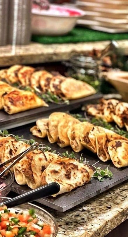 Silver Spoons catering team plating an event in Denver